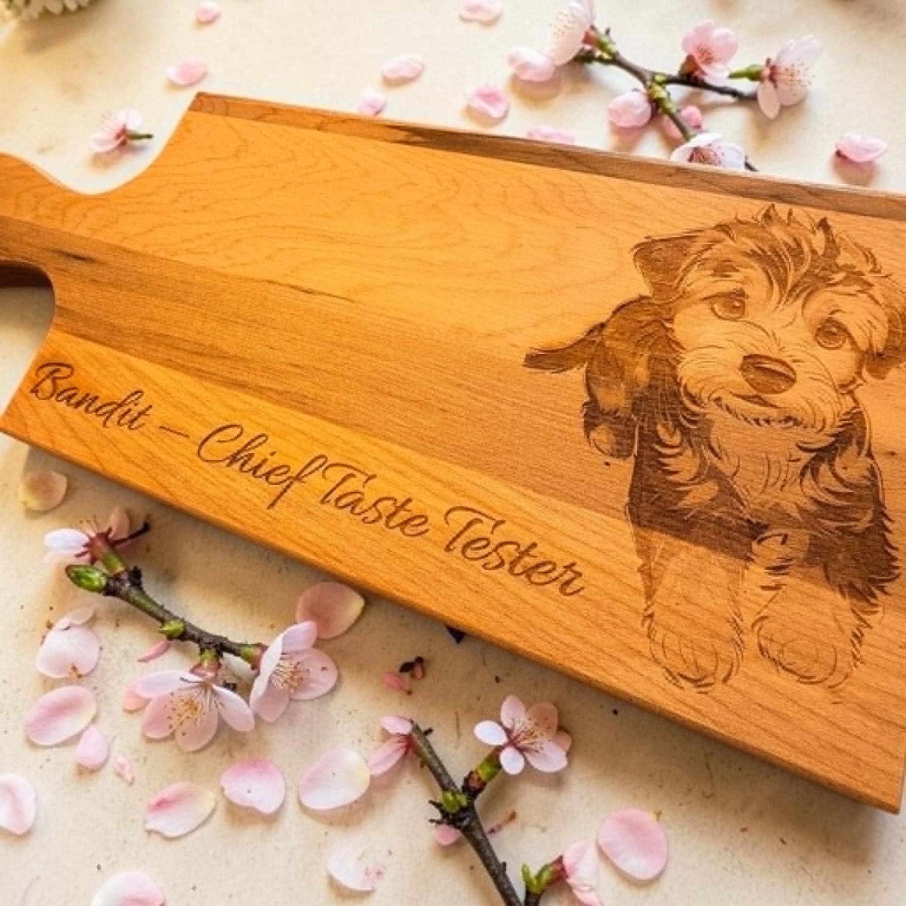 Cherry board engraved with a detailed portrait of a dog and his name